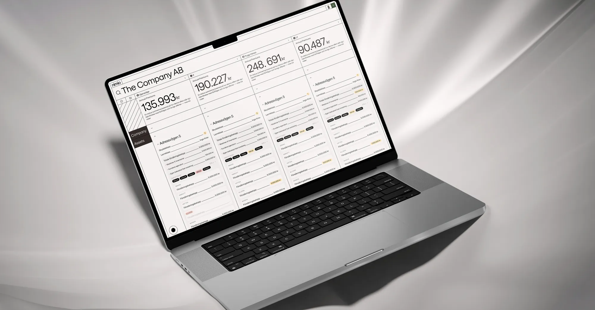 Nimio comparing insurer offers side by side on a laptop